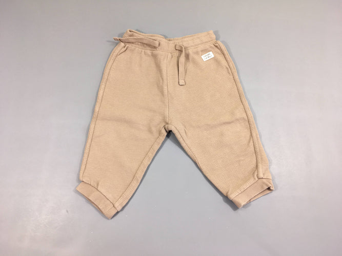 Pantalon molleton texturé beige, moins cher chez Petit Kiwi