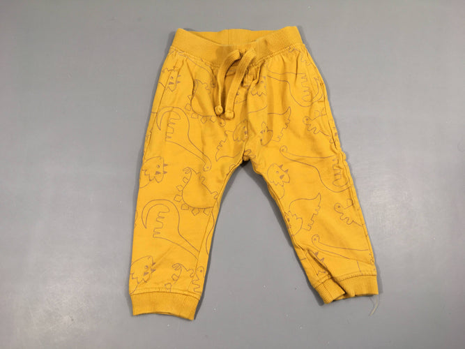 Pantalon de training jaune  dinos-Légèrement bouloché, moins cher chez Petit Kiwi