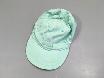 Casquette turquoise, auréole bord gauche