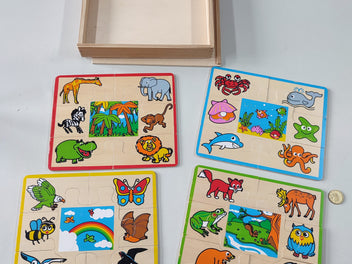 4 puzzles en bois animaux dans une boite en bois - Complet