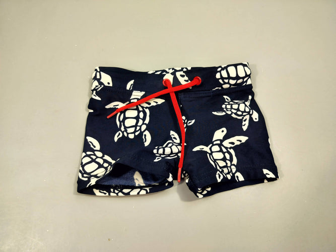 Maillot boxer  bleu marine , tortues blanches 80% polyamide  20% élasthanne, moins cher chez Petit Kiwi