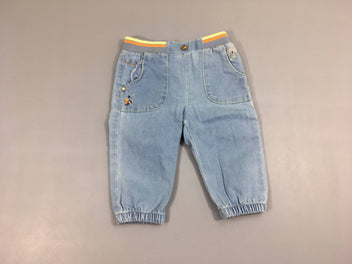 Pantalon denim clair éléphant, taille un peu boulochée