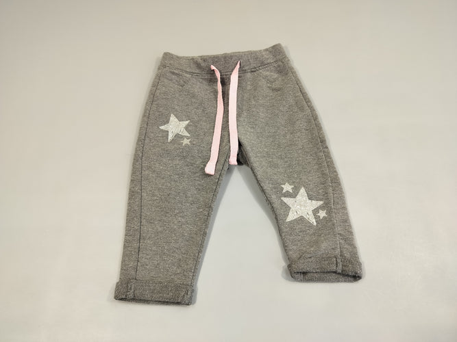 Pantalon molleton gris chiné, étoiles pailletées argentées. Cordon rose, moins cher chez Petit Kiwi