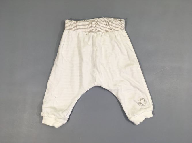Pantalon jersey réversible blanc/rayé beige taille et chevilles élastiques, moins cher chez Petit Kiwi