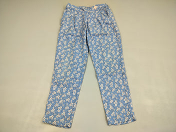 Pantalon fluide bleu, fleurs blanches , coquillage rose clair à la taille