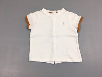 Polo m.c blanc bords ocre pressions au dos