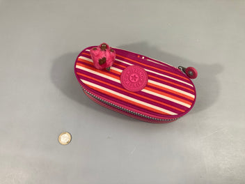 Trousse ronde rose rayé, intérieur taché