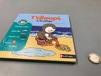 T'coupi à la plage, un peu usé