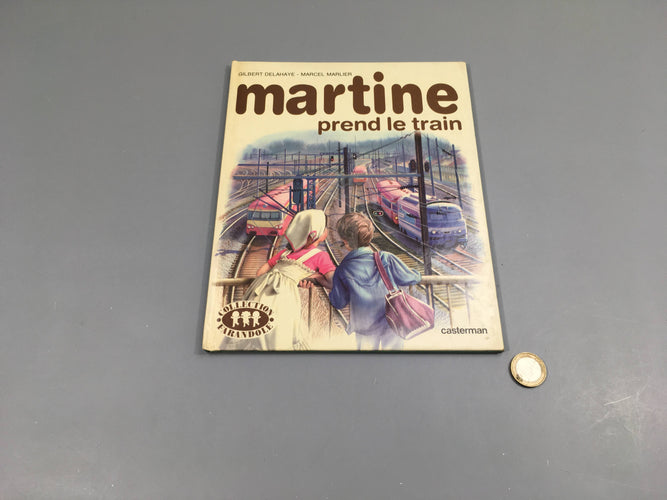 Martine prend le train, couverture jaunie, moins cher chez Petit Kiwi