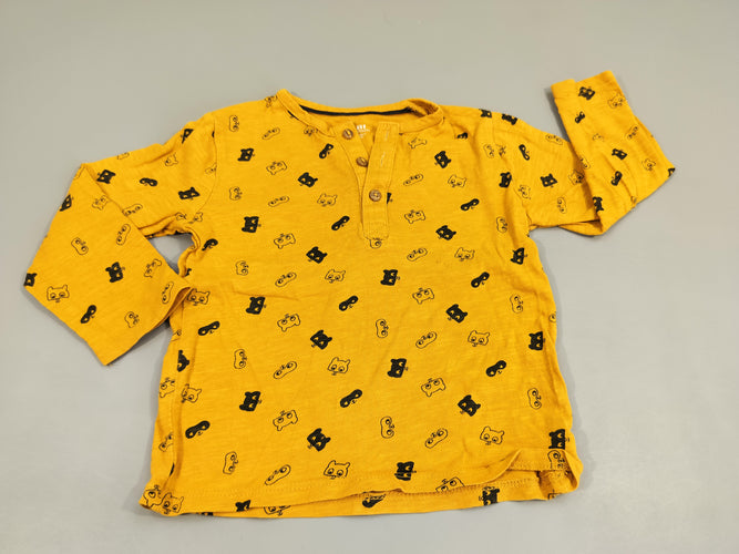 T-shirt m.l  jaune moutarde , motifs masques bleu marine ( petites taches), moins cher chez Petit Kiwi
