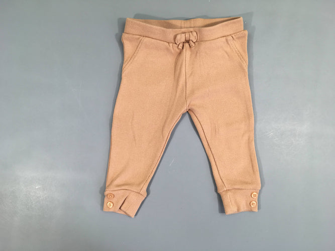 Pantalon molleton côte vieux rose noeud, un peu bouloché, moins cher chez Petit Kiwi