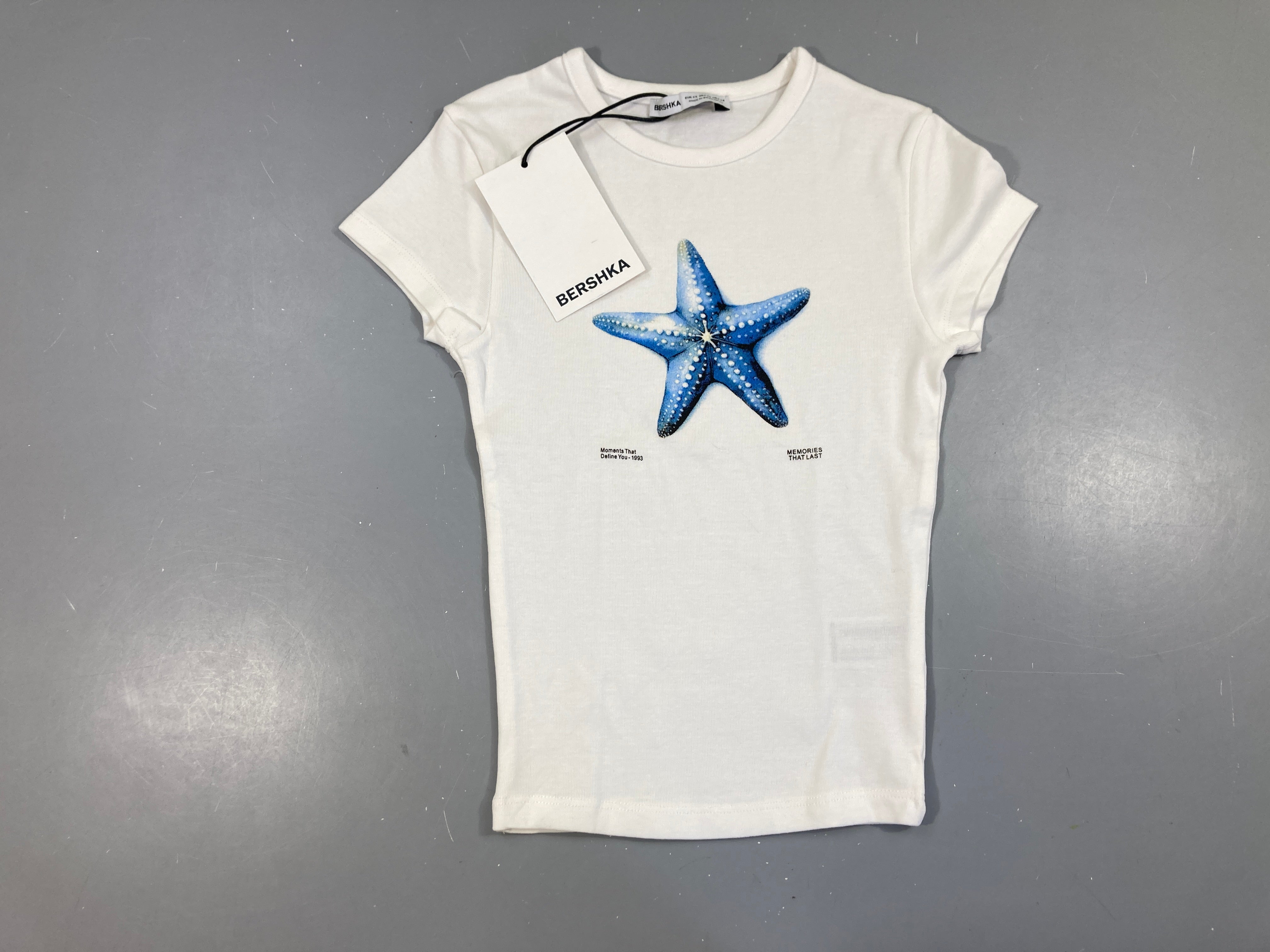 Neuf-T-shirt m.c blanc étoiles