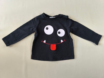 T-shirt m.l noir yeux et bouche de monstre langue qui passe