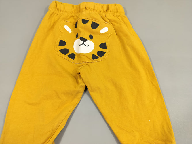 Pantalon jersey jaune, arrière tête de lion . Légère tache sur le dessous, moins cher chez Petit Kiwi