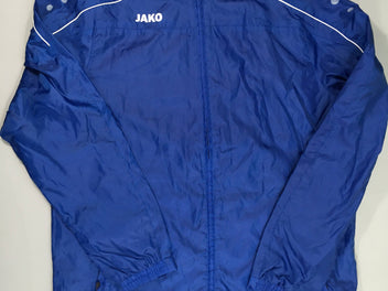 Veste de sport bleue à capuche repositionnable Jako