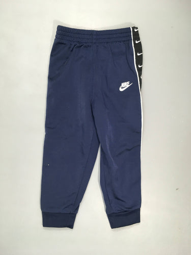 Pantalon jogging bleu marine/blanc "Nike"  100% polyester Très légèrement bouloché, moins cher chez Petit Kiwi