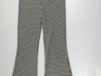 Pantalon évasé carreaux noir/blanc, légèrement bouloché