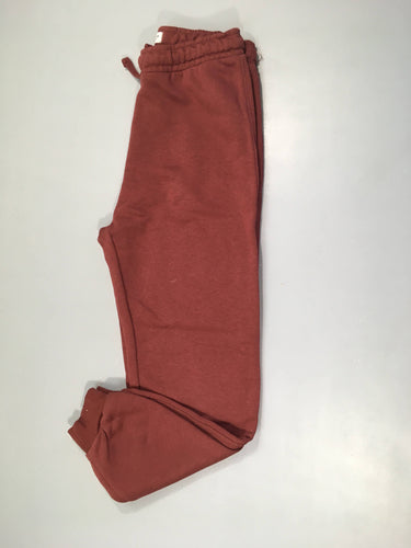 Pantalon de training bordeaux, légèrement bouloché, moins cher chez Petit Kiwi