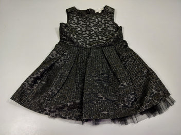 Robe s.m noire avec motifs en fils dorés . 59% viscose 31% polyester 10% fil métallisé. . Doublure 100% coton